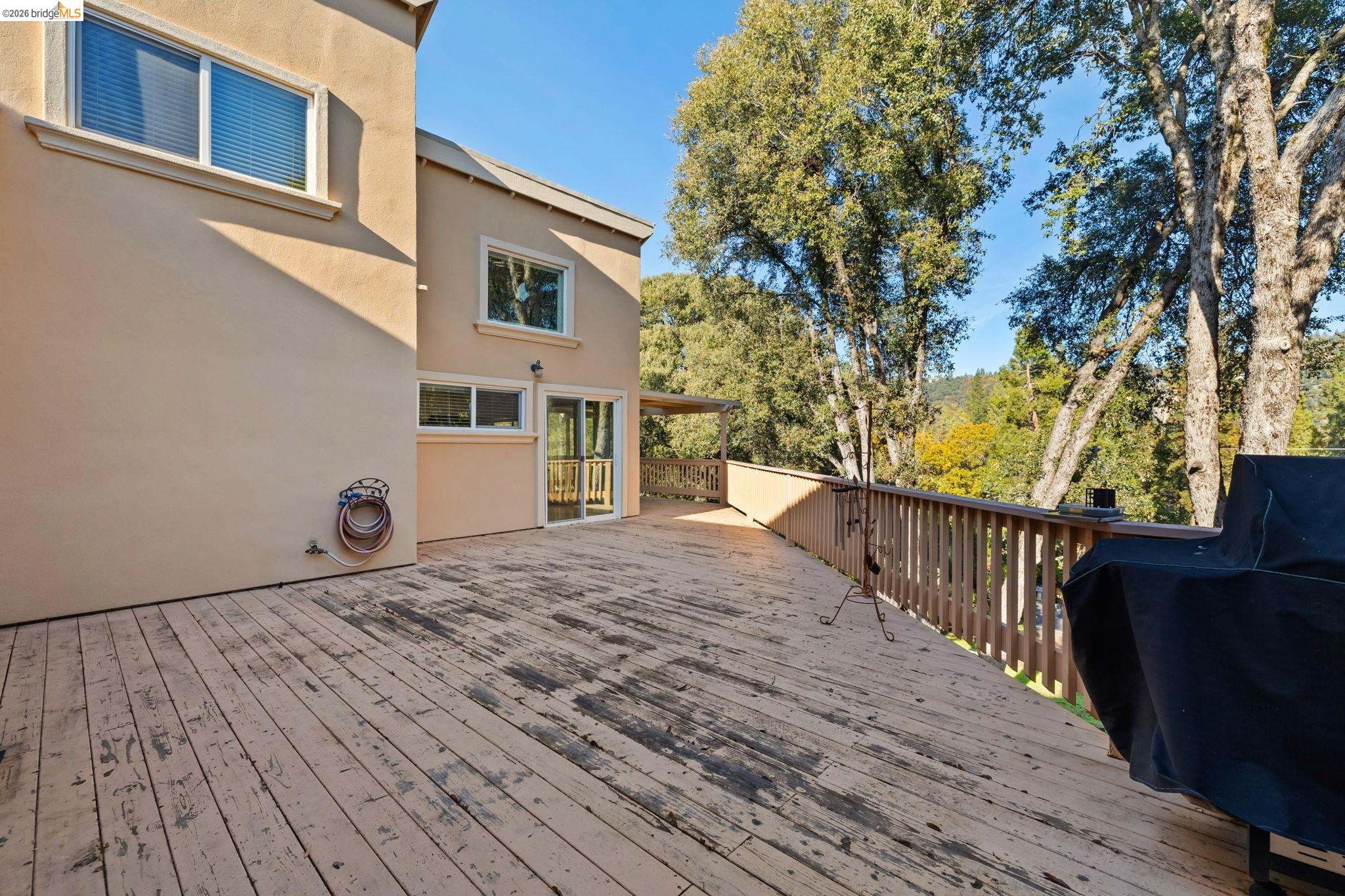 21916 Phoenix Lake Road Sonora, CA 95370 - Photo 39 of 48 a view of a house with a roof deck