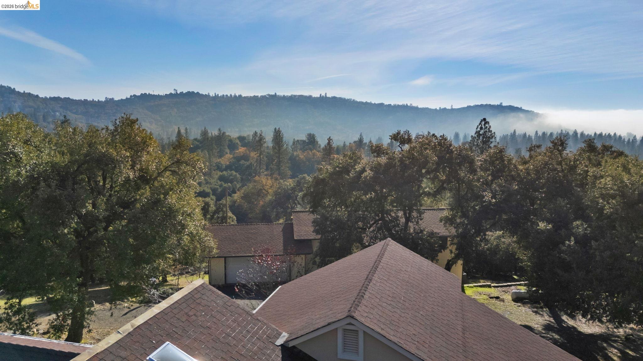 21916 Phoenix Lake Road Sonora, CA 95370 - Photo 45 of 48 a view of a terrace with a lake view