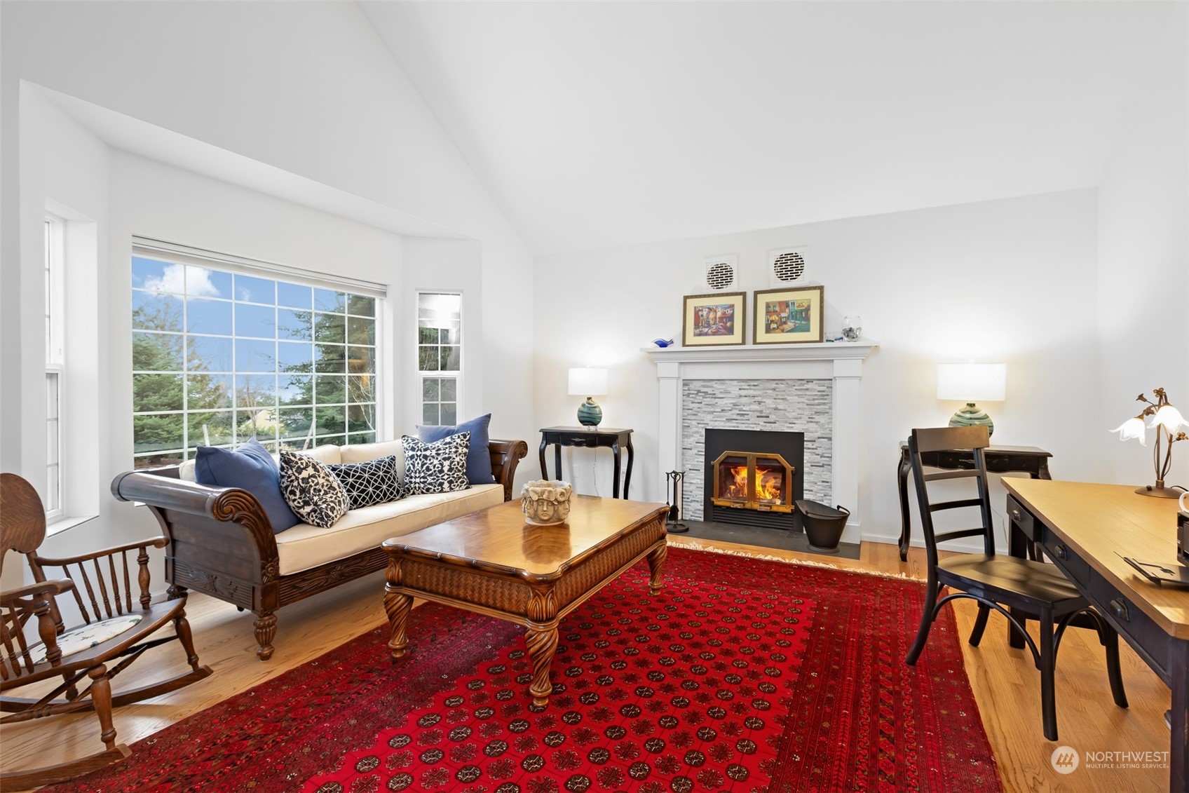 443 Doe Run Road Sequim, WA 98382 - Photo 4 of 39 a living room with furniture and a fireplace
