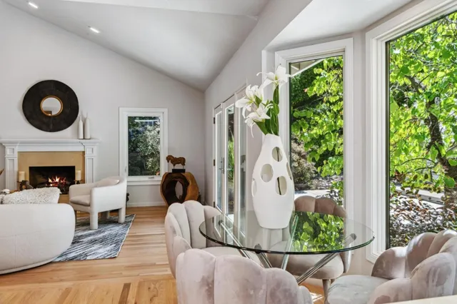 a view of a balcony with chair and table