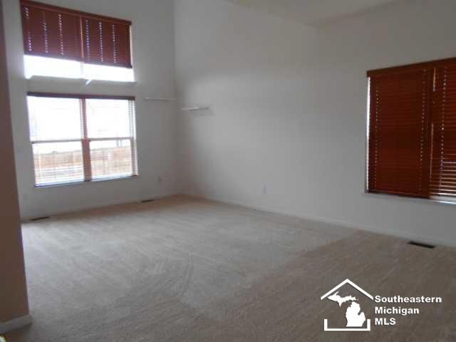 842 Golf Ridge Circle Dundee, MI 48131 - Photo 2 of 24 Spacious living room