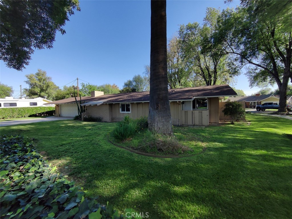 4752 Barrington Court Riverside, CA 92506 - Photo 1 of 1 a view of a house with a yard and potted plants