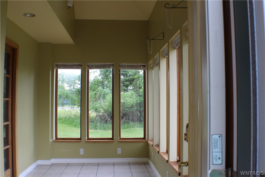 94 Longview Avenue Ellicott, NY 14701 - Photo 19 of 48 Sunroom