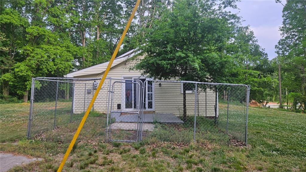 471 Perkins Circle Canton, GA 30115 - Photo 3 of 20 a backyard of a house with a swing