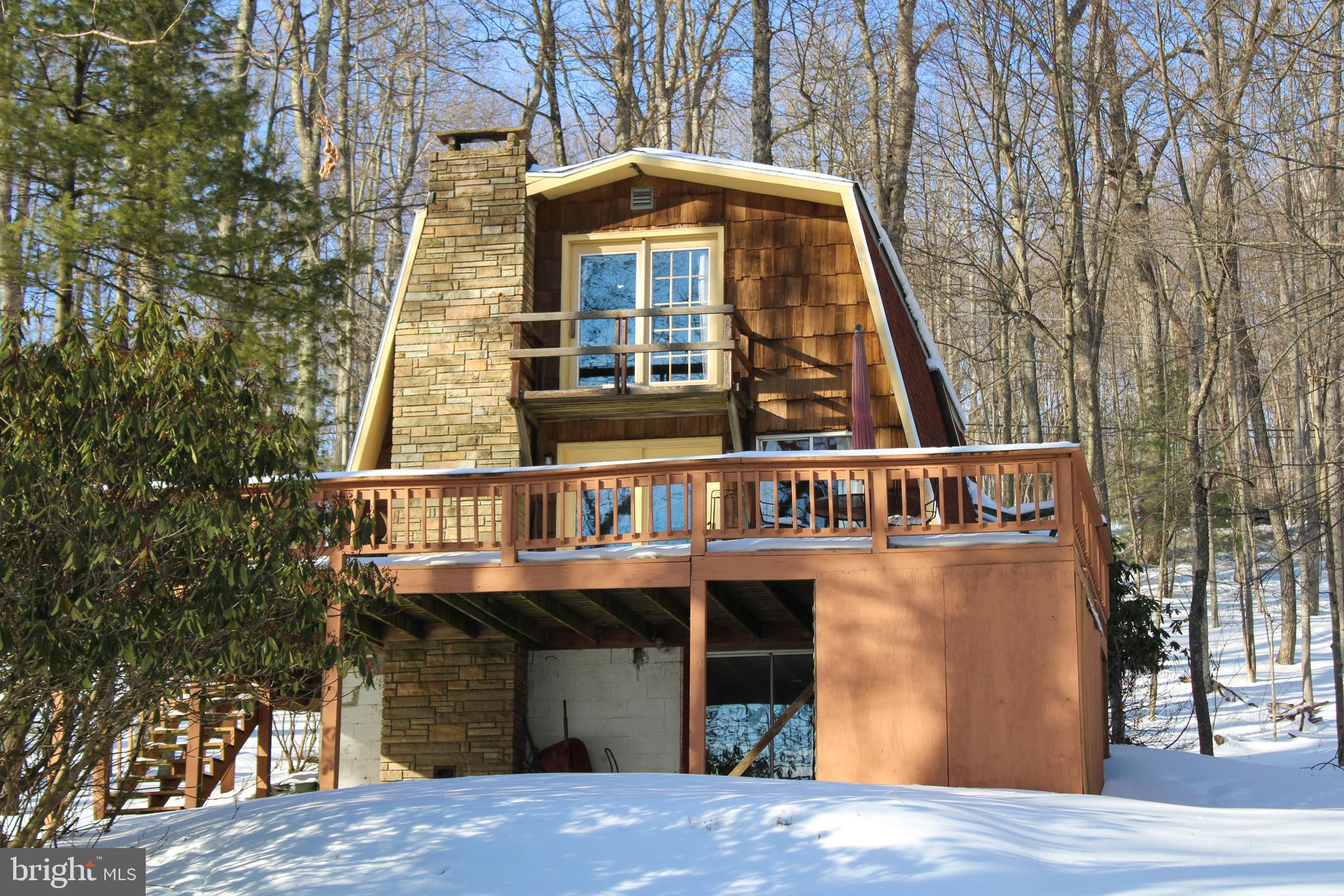 135 Glen Cove Road Swanton, MD 21561 - Photo 6 of 15 a front view of a house with a yard