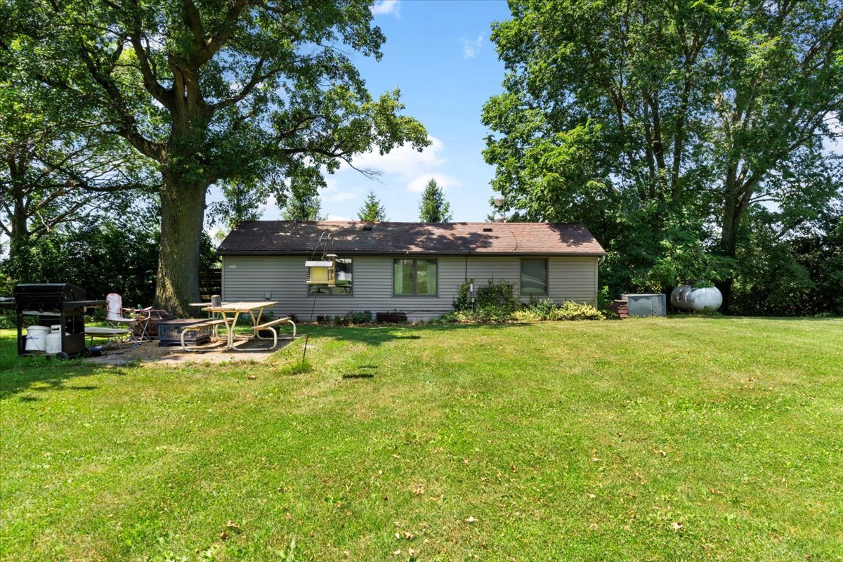 5460 Moline Road Erie, IL 61250 - Photo 14 of 38 a view of a house with swimming pool and sitting area