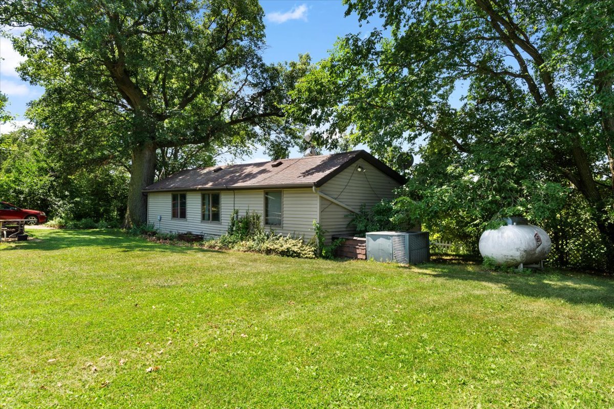 5460 Moline Road Erie, IL 61250 - Photo 15 of 38 a front view of a house with yard and porch