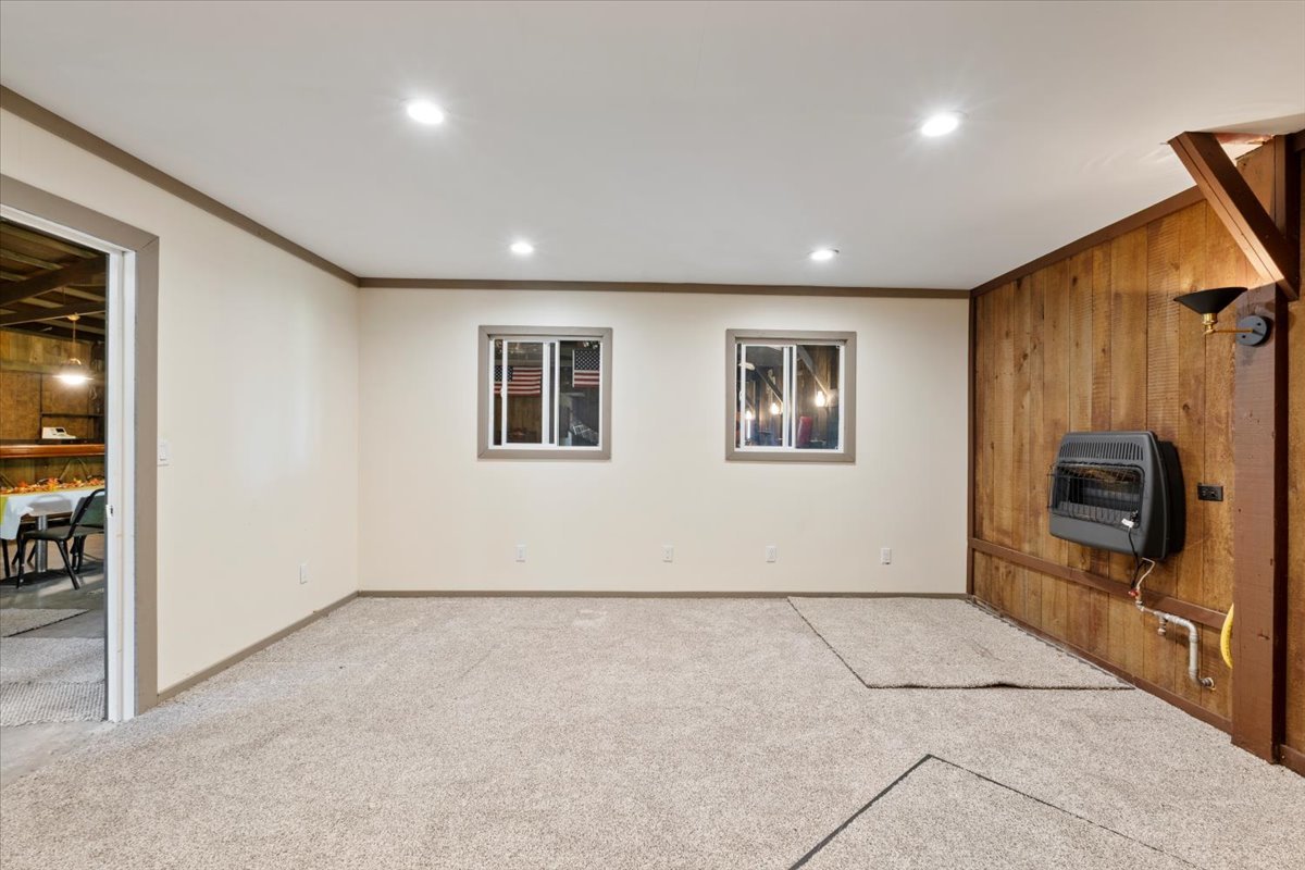 5460 Moline Road Erie, IL 61250 - Photo 27 of 38 a view of a livingroom with an empty space and a fireplace