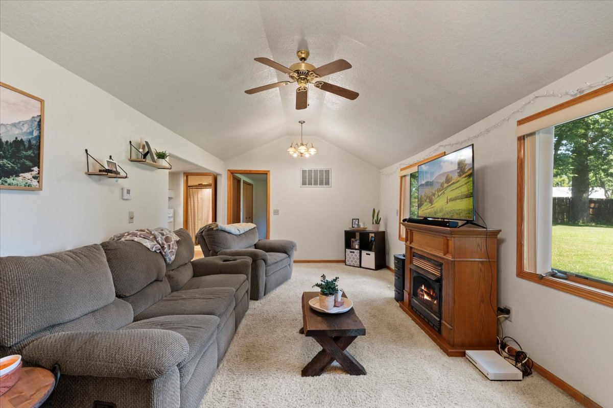 5460 Moline Road Erie, IL 61250 - Photo 3 of 38 a living room with furniture and a flat screen tv