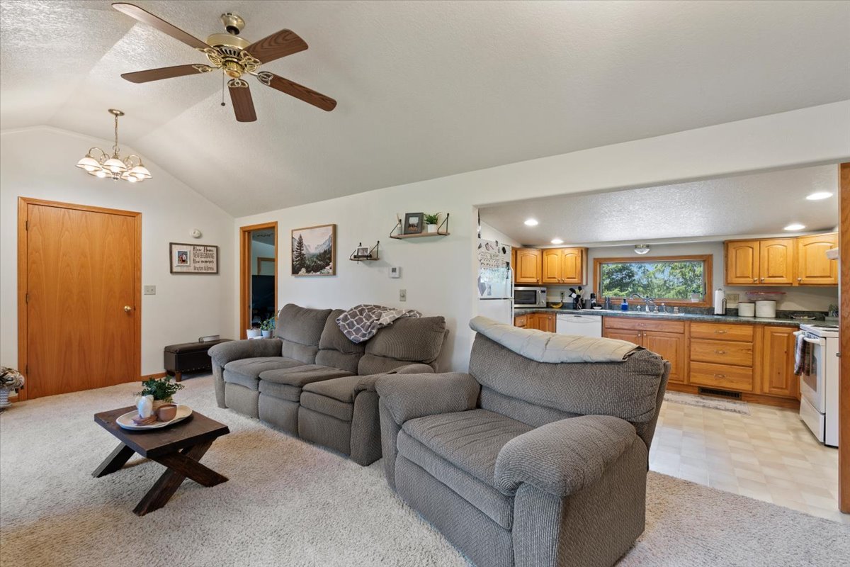 5460 Moline Road Erie, IL 61250 - Photo 4 of 38 a living room with furniture and kitchen view