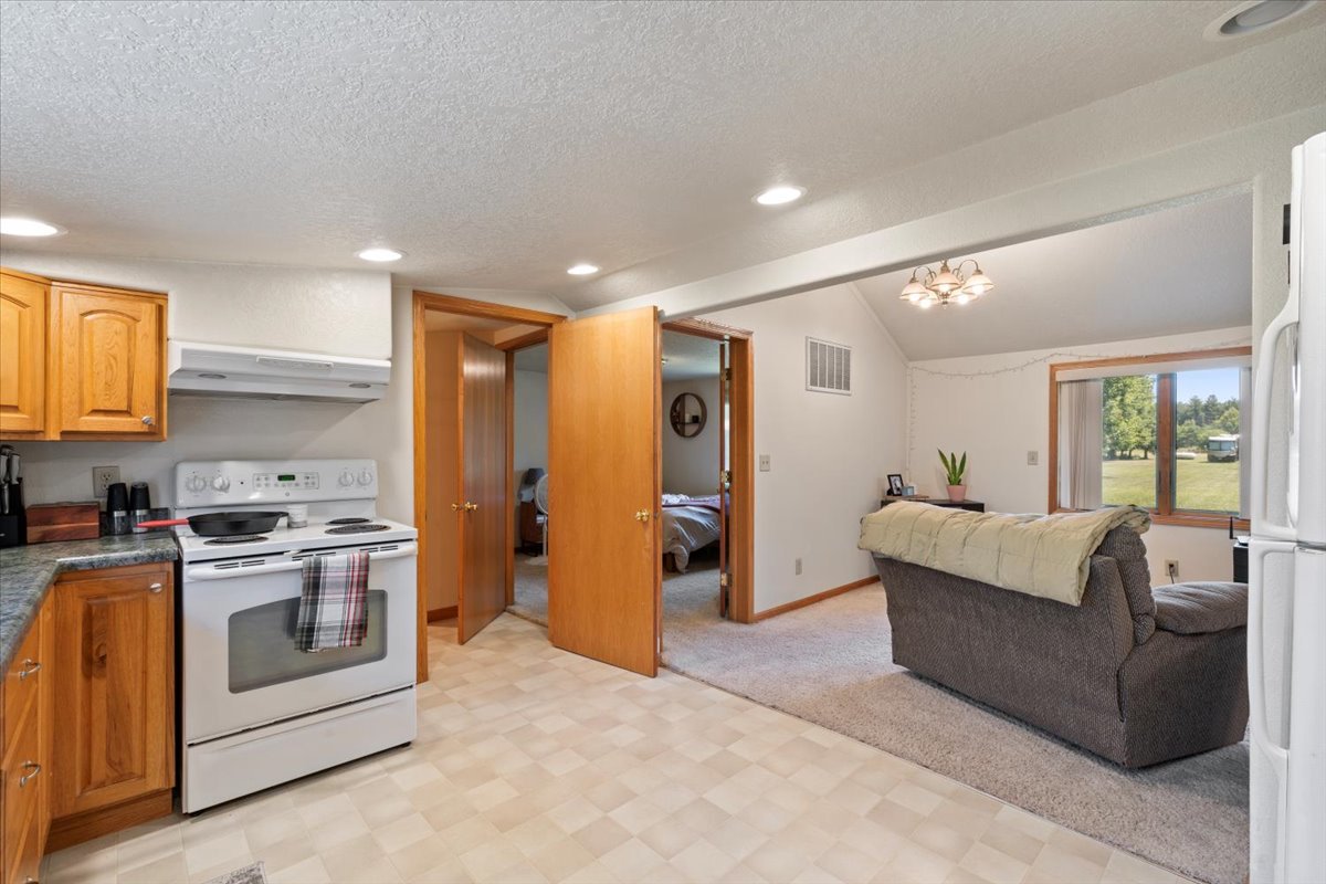 5460 Moline Road Erie, IL 61250 - Photo 7 of 38 a living room with stainless steel appliances furniture and a window