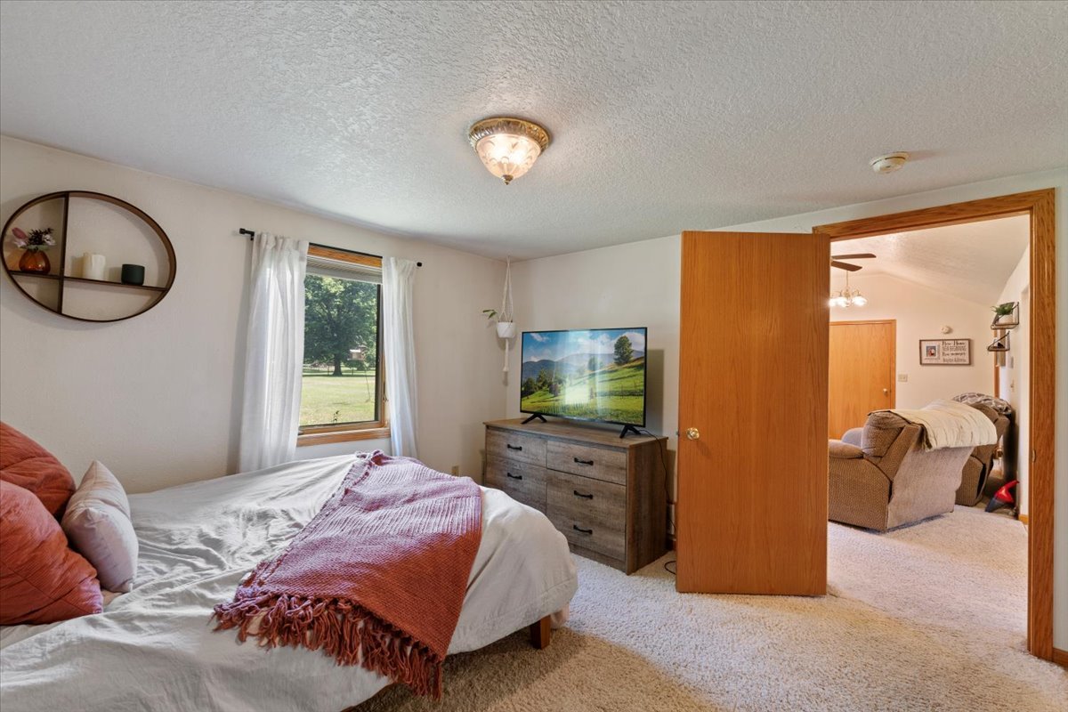 5460 Moline Road Erie, IL 61250 - Photo 9 of 38 a bedroom with a bed and furniture