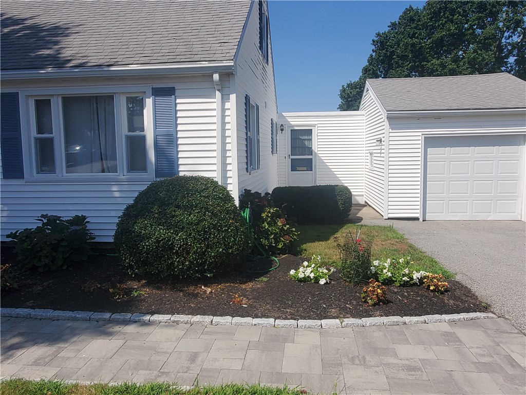 139 Coggeshall Avenue Newport, RI 02840 - Photo 42 of 50 Back Door to Covered Porch Breezeway leads to back kitchen door/deck/garage