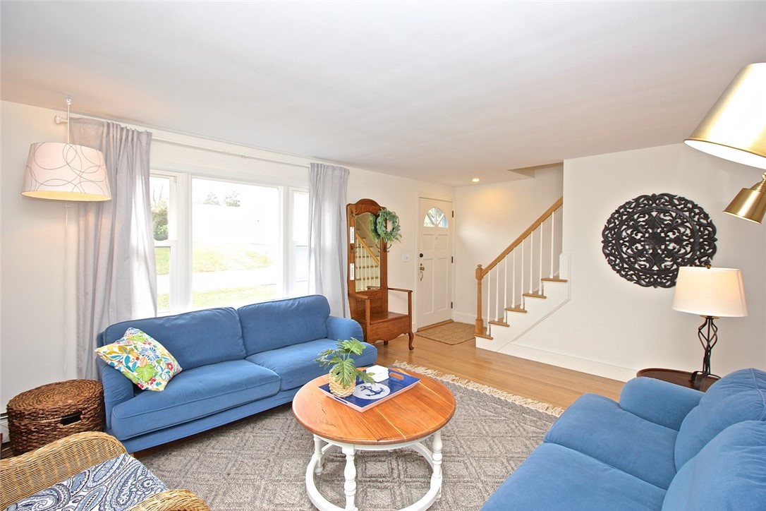 139 Coggeshall Avenue Newport, RI 02840 - Photo 6 of 50 Living Room view to Front Door and stairway to second floor