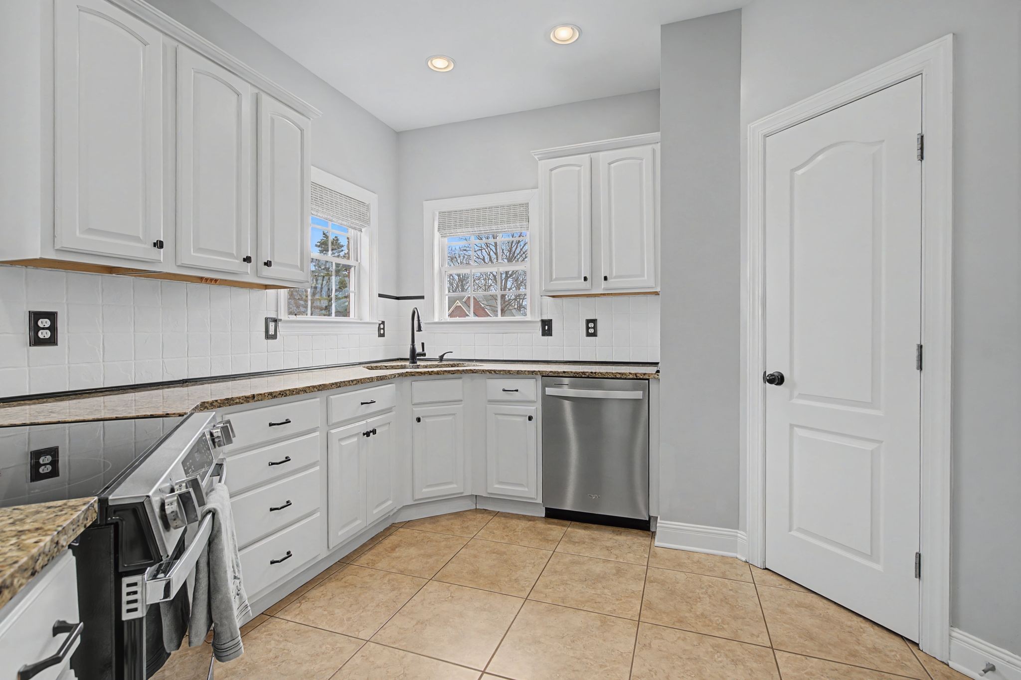 7331 McCormick Drive Fairview, TN 37062 - Photo 11 of 46 a kitchen with cabinets and window
