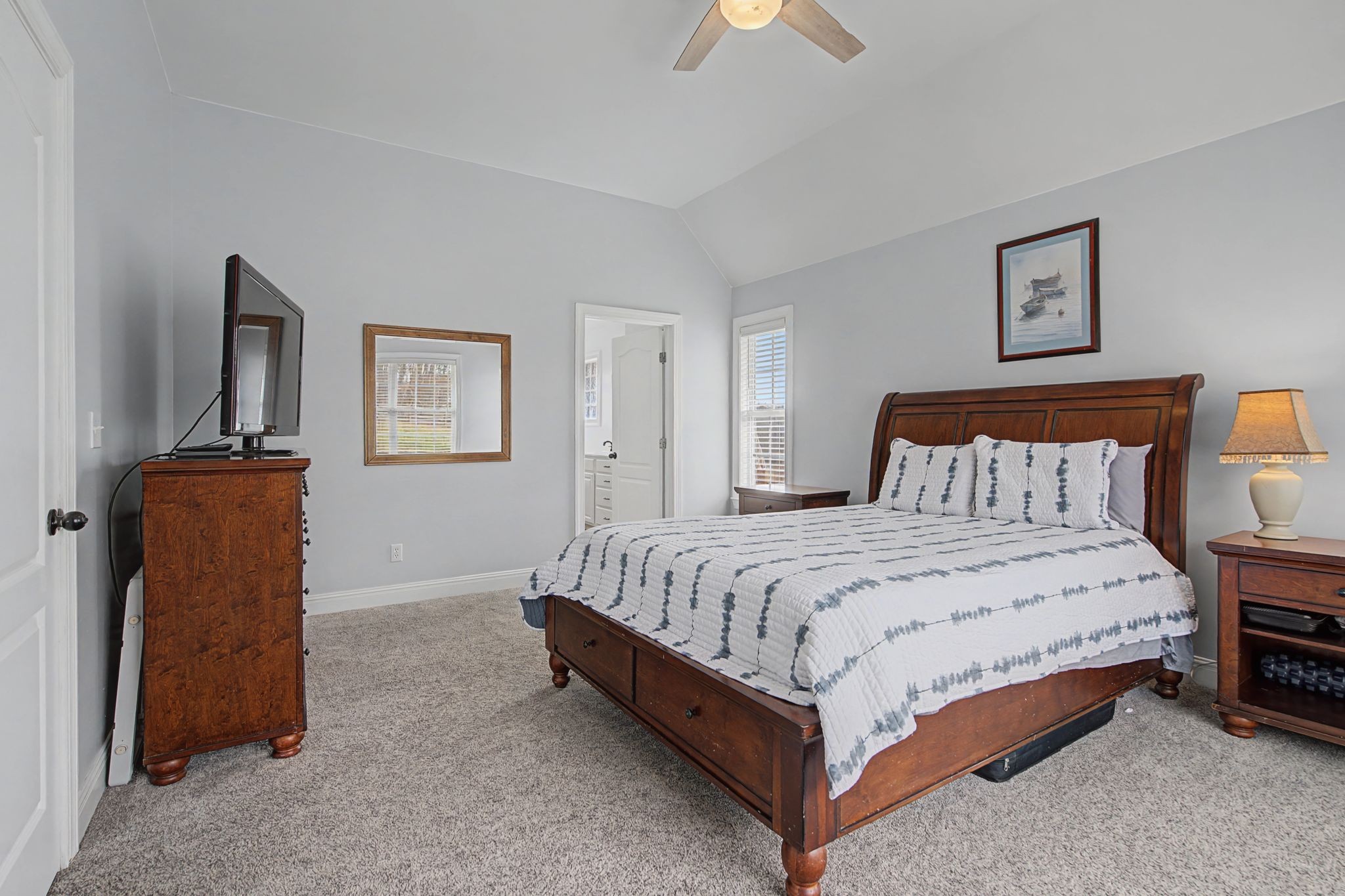 7331 McCormick Drive Fairview, TN 37062 - Photo 16 of 46 a bedroom with bed and a night stand