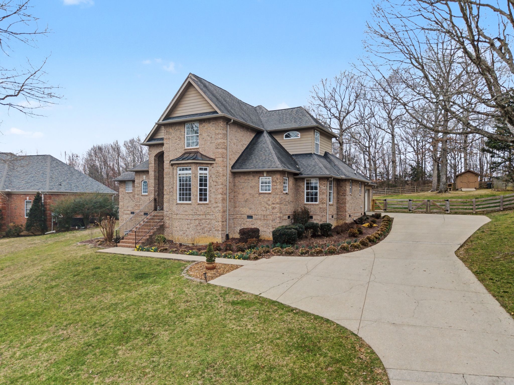 7331 McCormick Drive Fairview, TN 37062 - Photo 2 of 46 a view of a house with a yard
