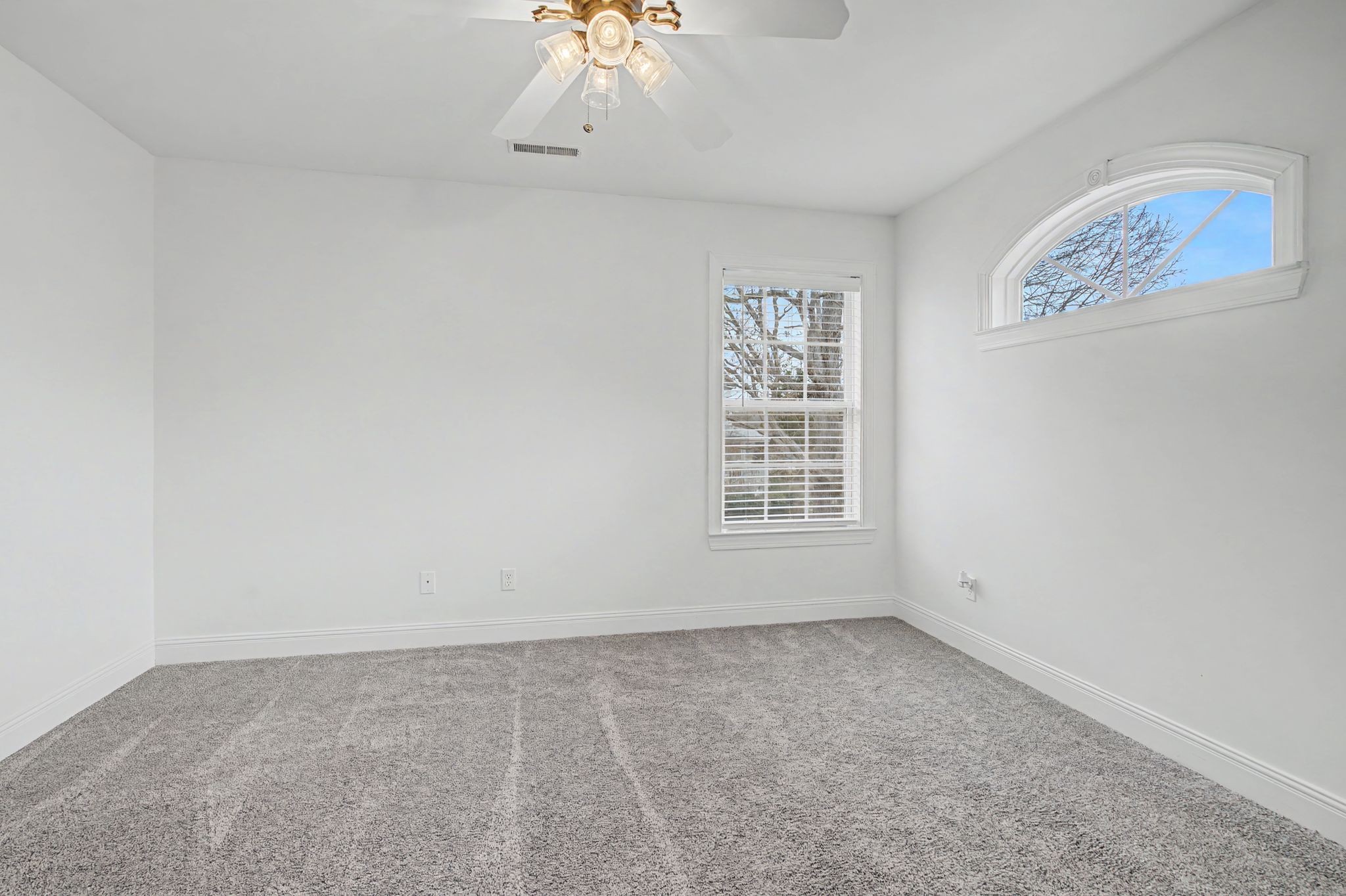7331 McCormick Drive Fairview, TN 37062 - Photo 27 of 46 an empty room with windows