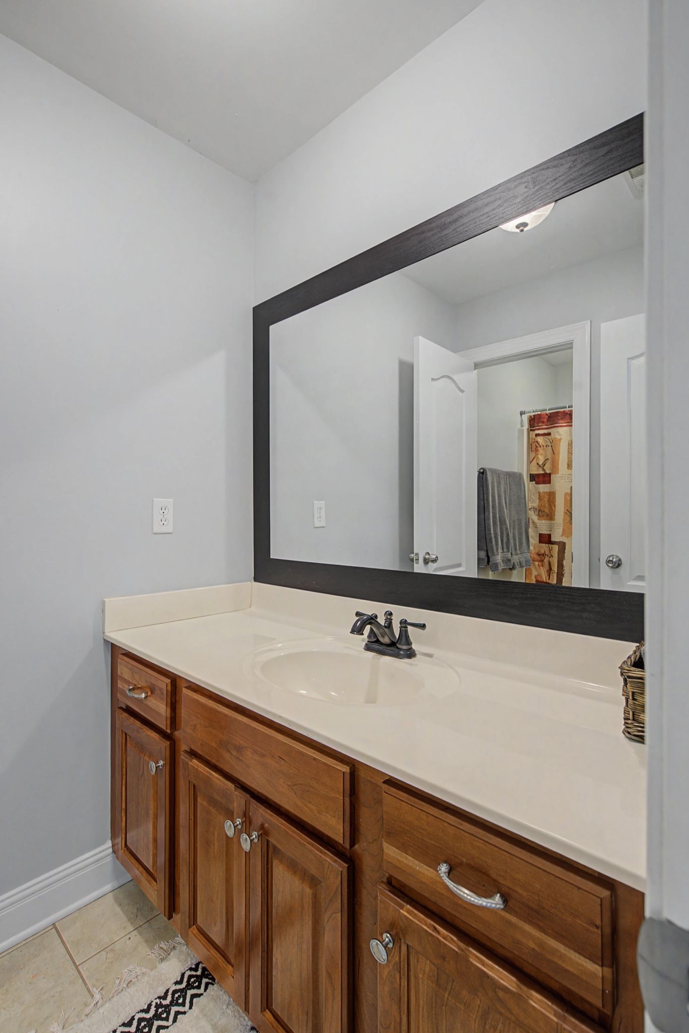 7331 McCormick Drive Fairview, TN 37062 - Photo 30 of 46 a bathroom with a sink and a mirror