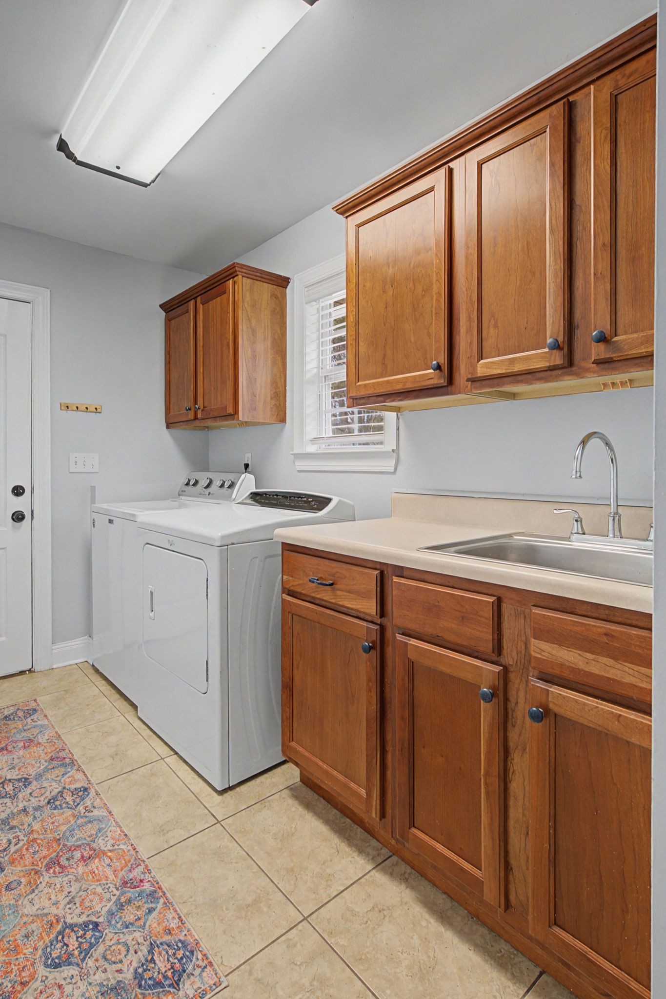 7331 McCormick Drive Fairview, TN 37062 - Photo 34 of 46 a kitchen with a sink cabinets and window