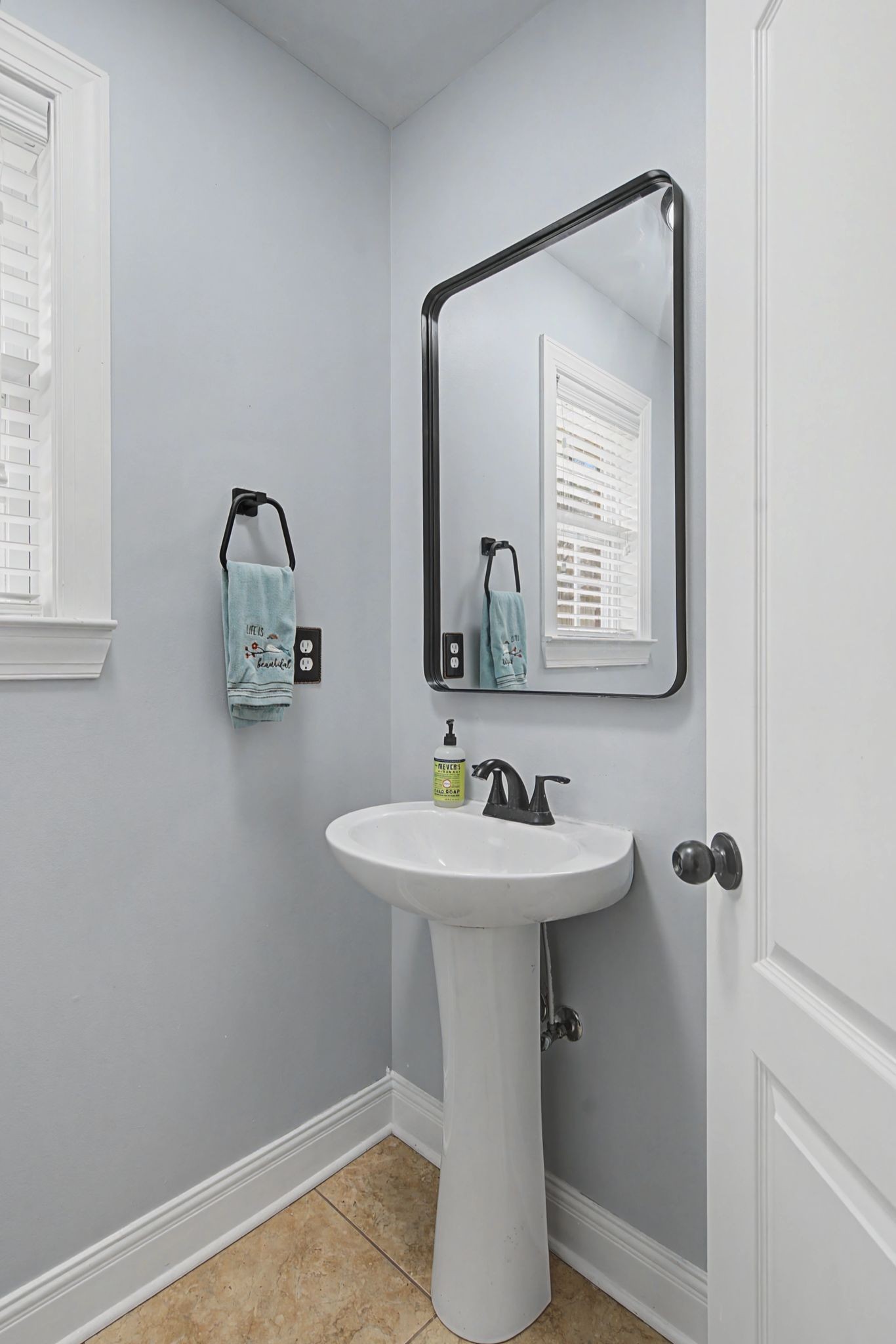 7331 McCormick Drive Fairview, TN 37062 - Photo 35 of 46 a bathroom with a sink mirror and vanity