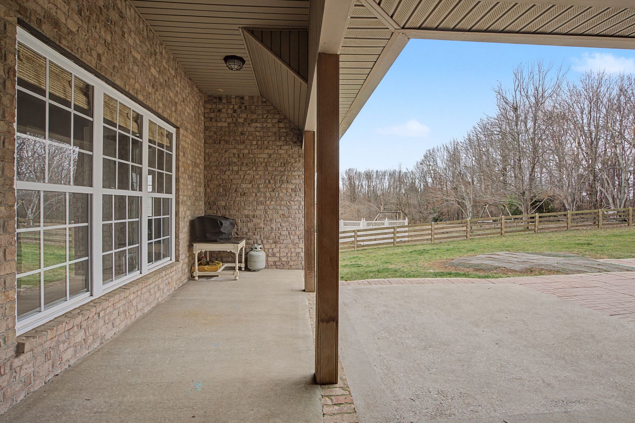 7331 McCormick Drive Fairview, TN 37062 - Photo 39 of 46 a view of a porch with chairs and backyard