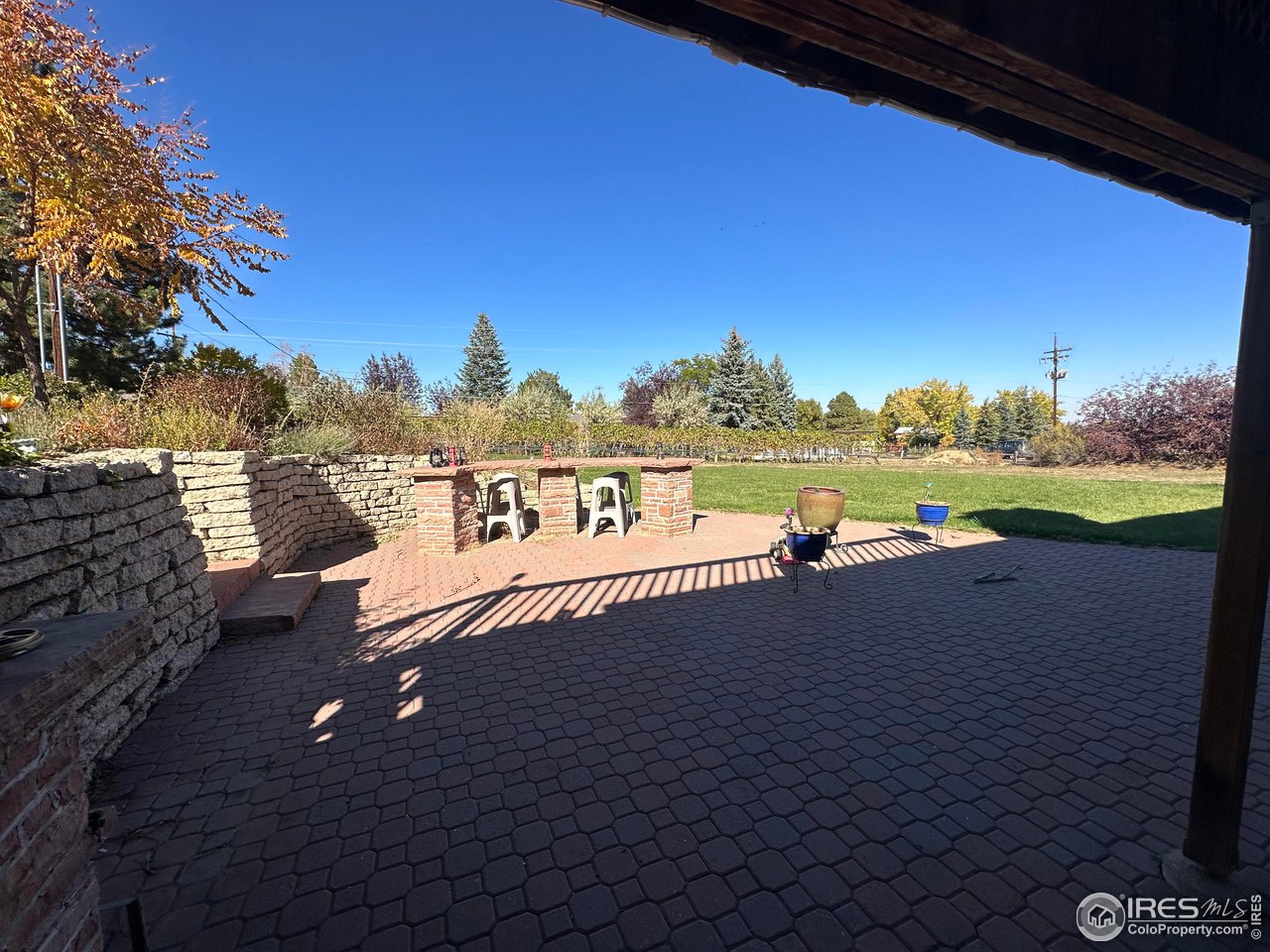 9057 Morton Road Niwot, CO 80503 - Photo 25 of 31 looking out to entertainment patio from basement entry