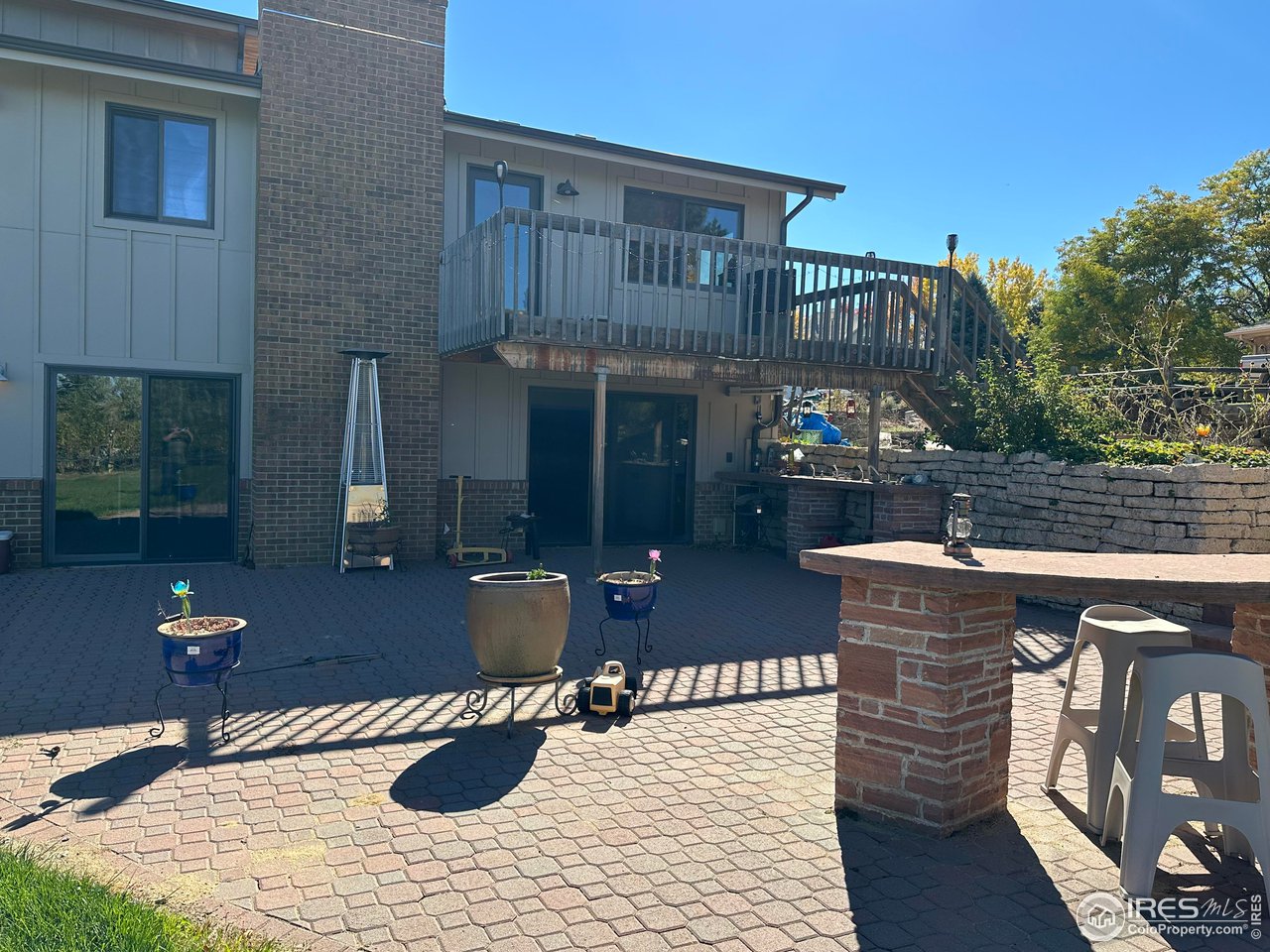 9057 Morton Road Niwot, CO 80503 - Photo 26 of 31 looking back on paver patio, entertainment space