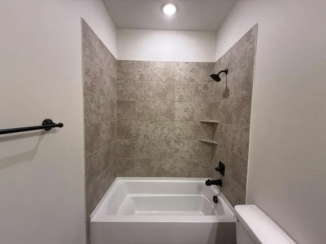 a bathroom with a bathtub