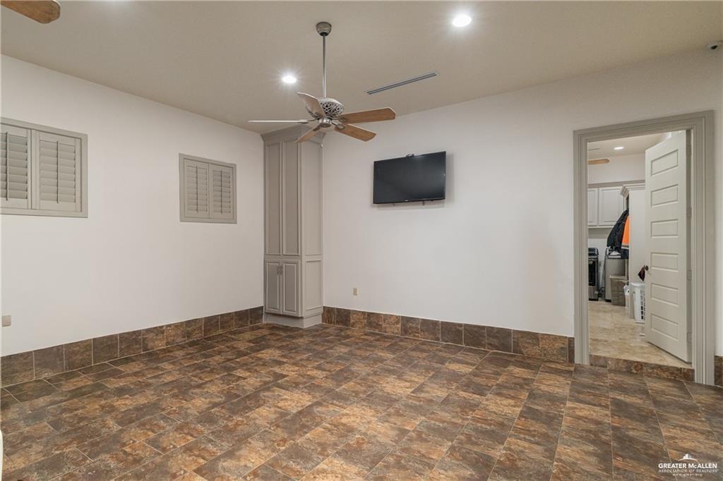 1205 Travis Street Mission, TX 78572 - Photo 18 of 45 a view of a livingroom with a flat screen tv