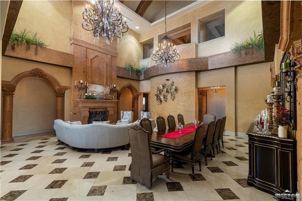 1205 Travis Street Mission, TX 78572 - Photo 8 of 45 a living room with furniture and a fireplace