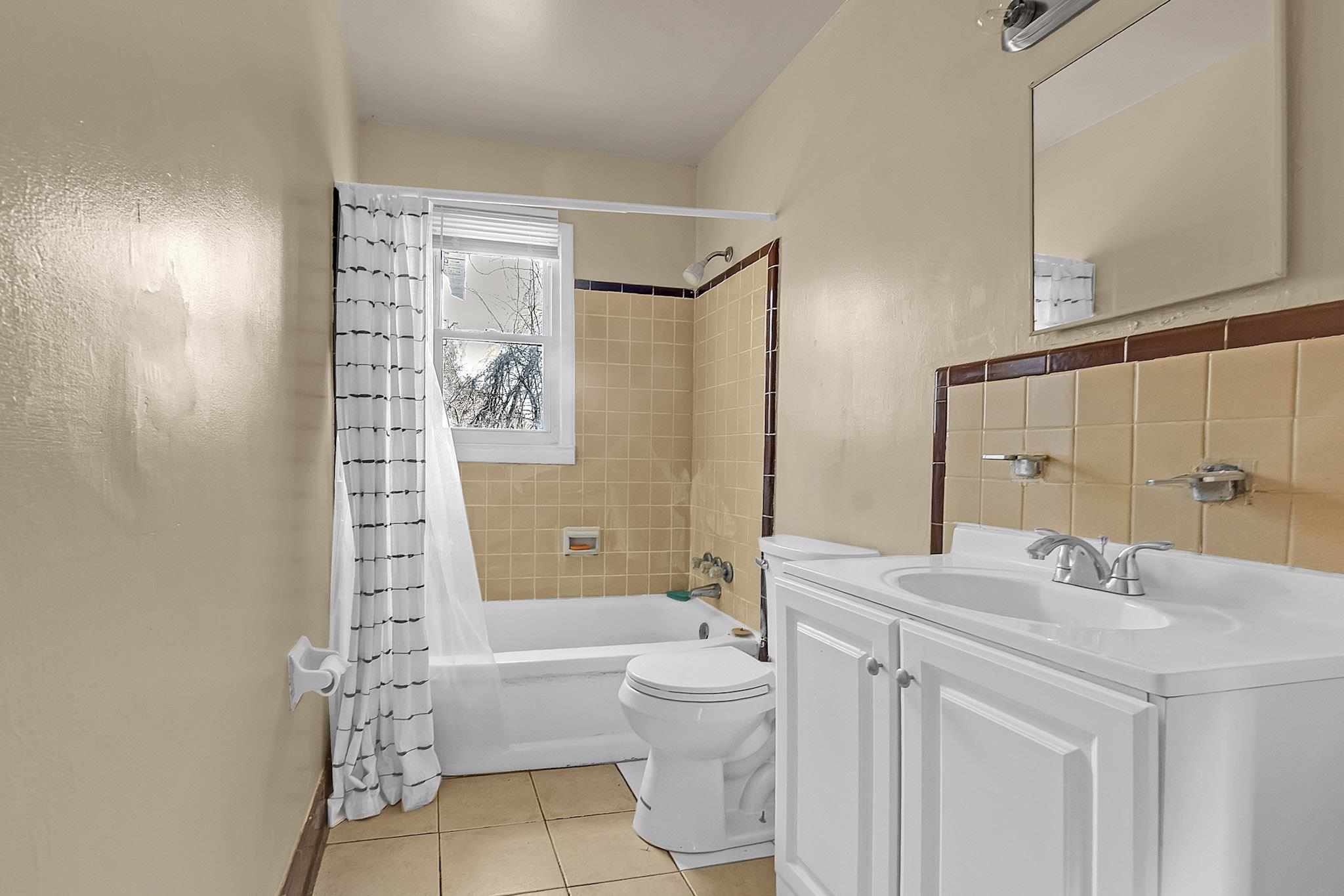 2196 Ketchum Road Memphis, TN 38114 - Photo 11 of 20 a bathroom with a sink a toilet and shower