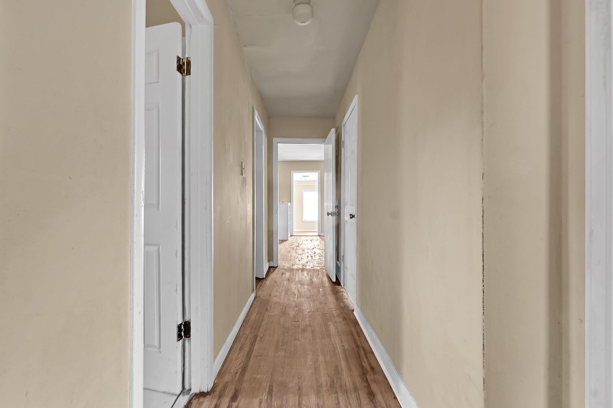 2196 Ketchum Road Memphis, TN 38114 - Photo 10 of 20 a view of a hallway with wooden floor