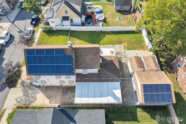 a view of swimming pool with seating area