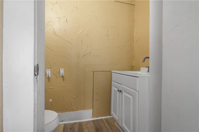 a bathroom with a sink and vanity