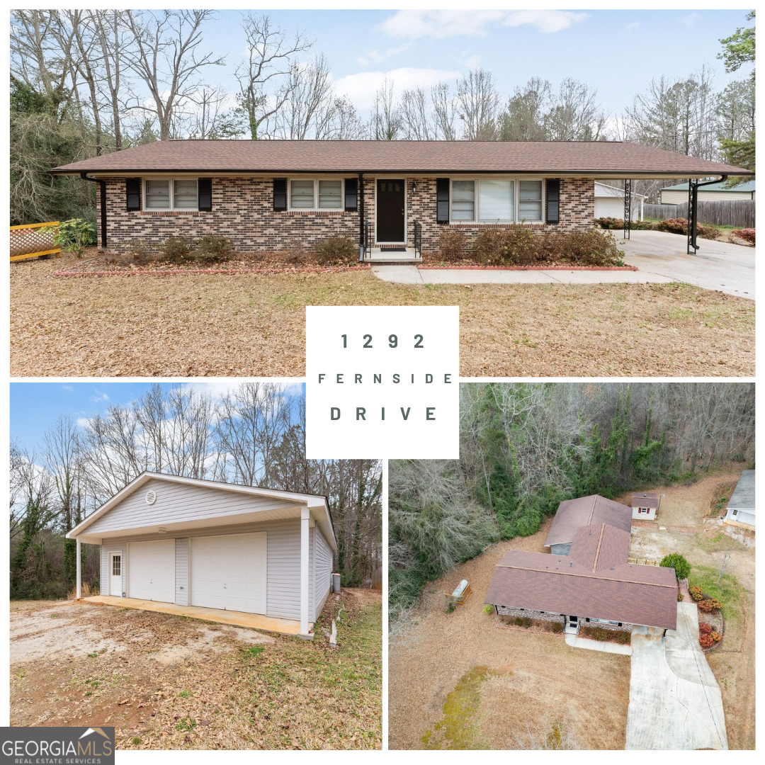 1292 Fernside Drive Toccoa, GA 30577 - Photo 1 of 42 a front view of a house with a garden