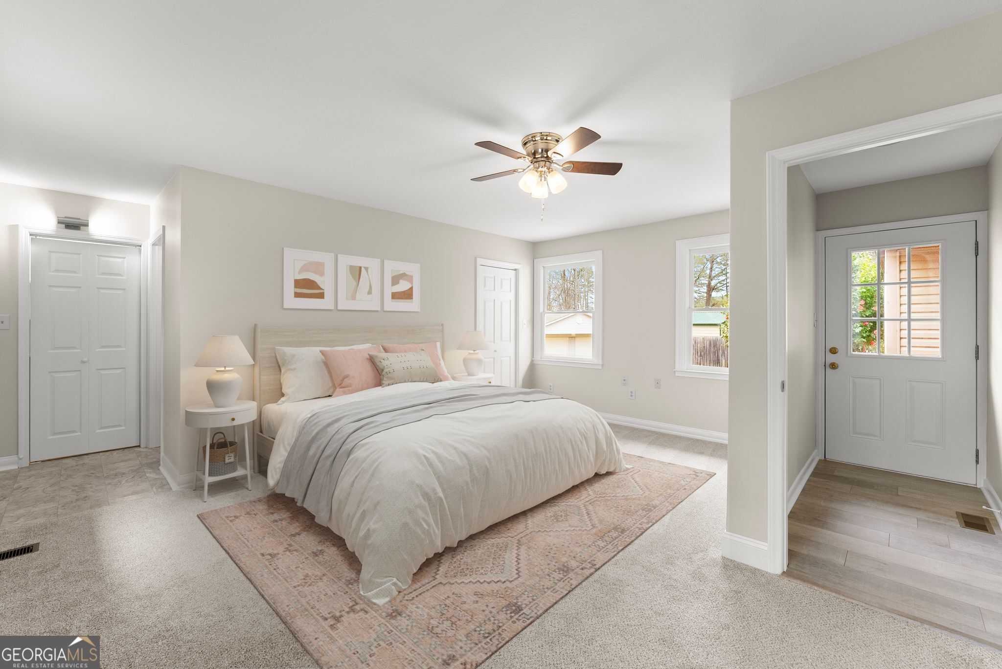 1292 Fernside Drive Toccoa, GA 30577 - Photo 16 of 42 a spacious bedroom with a large bed and a chandelier