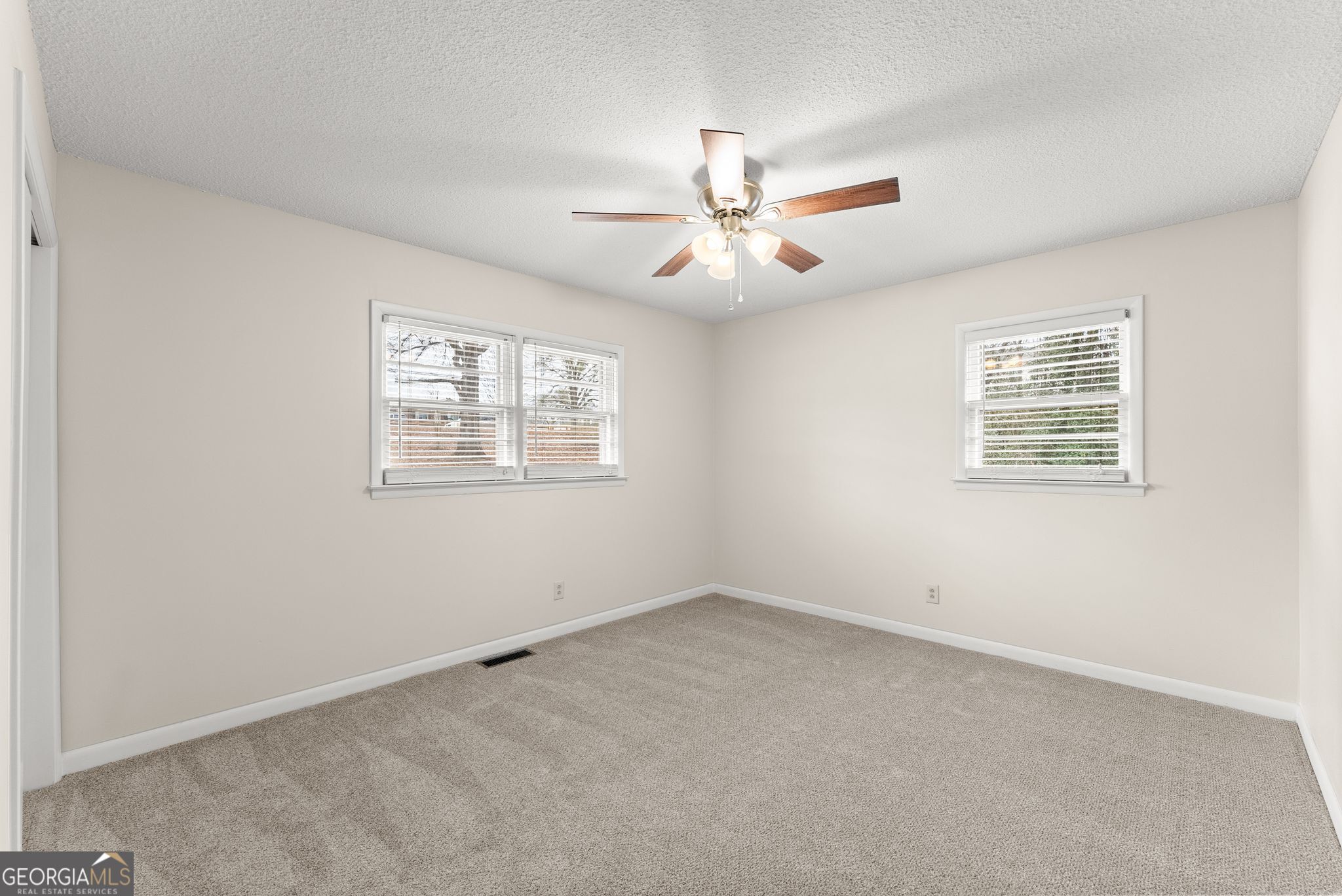 1292 Fernside Drive Toccoa, GA 30577 - Photo 21 of 42 wooden floor in an empty room with a window