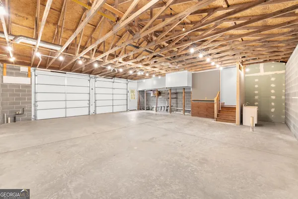 a view of a garage with furniture