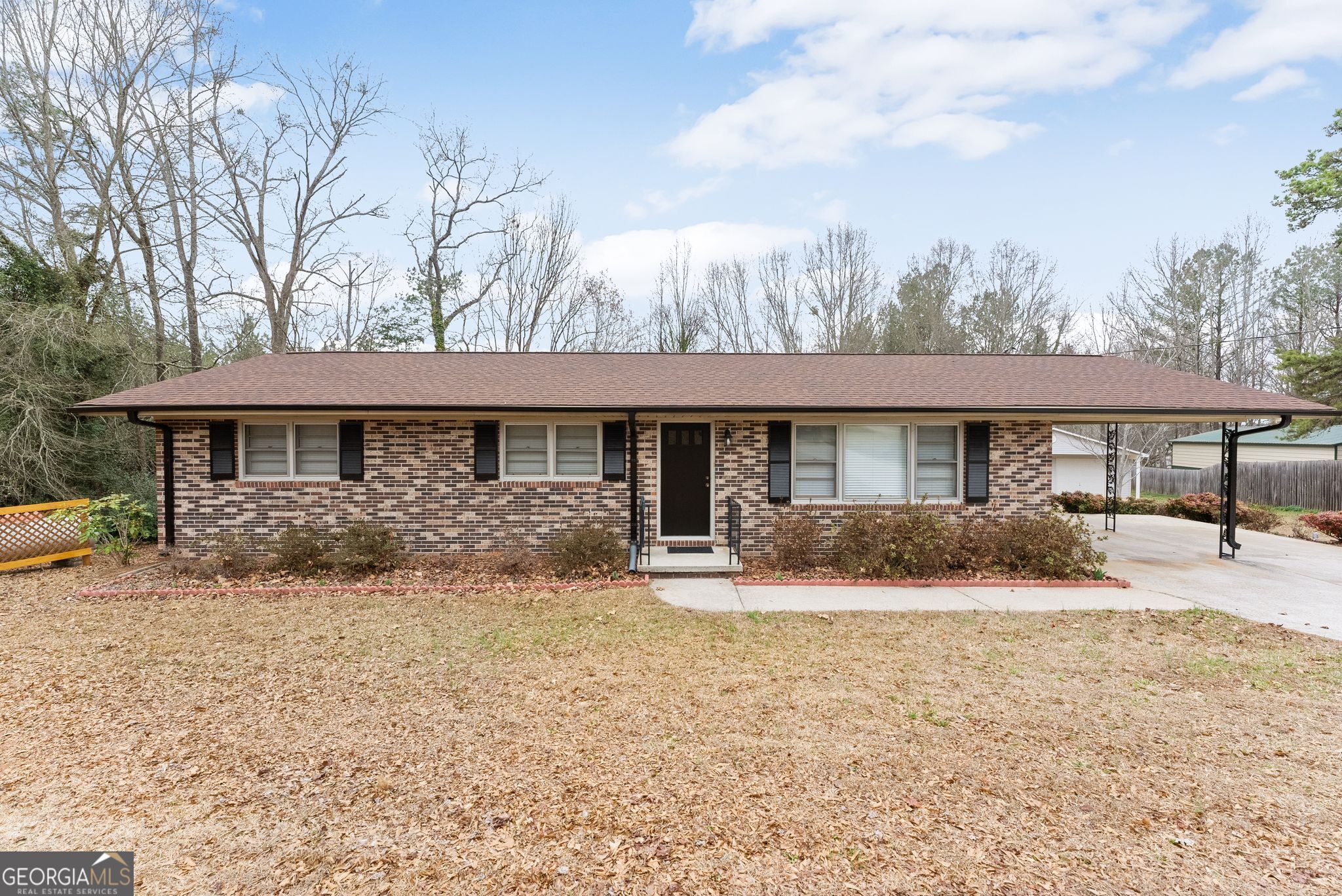 1292 Fernside Drive Toccoa, GA 30577 - Photo 37 of 42 a front view of a house with a yard covered in snow