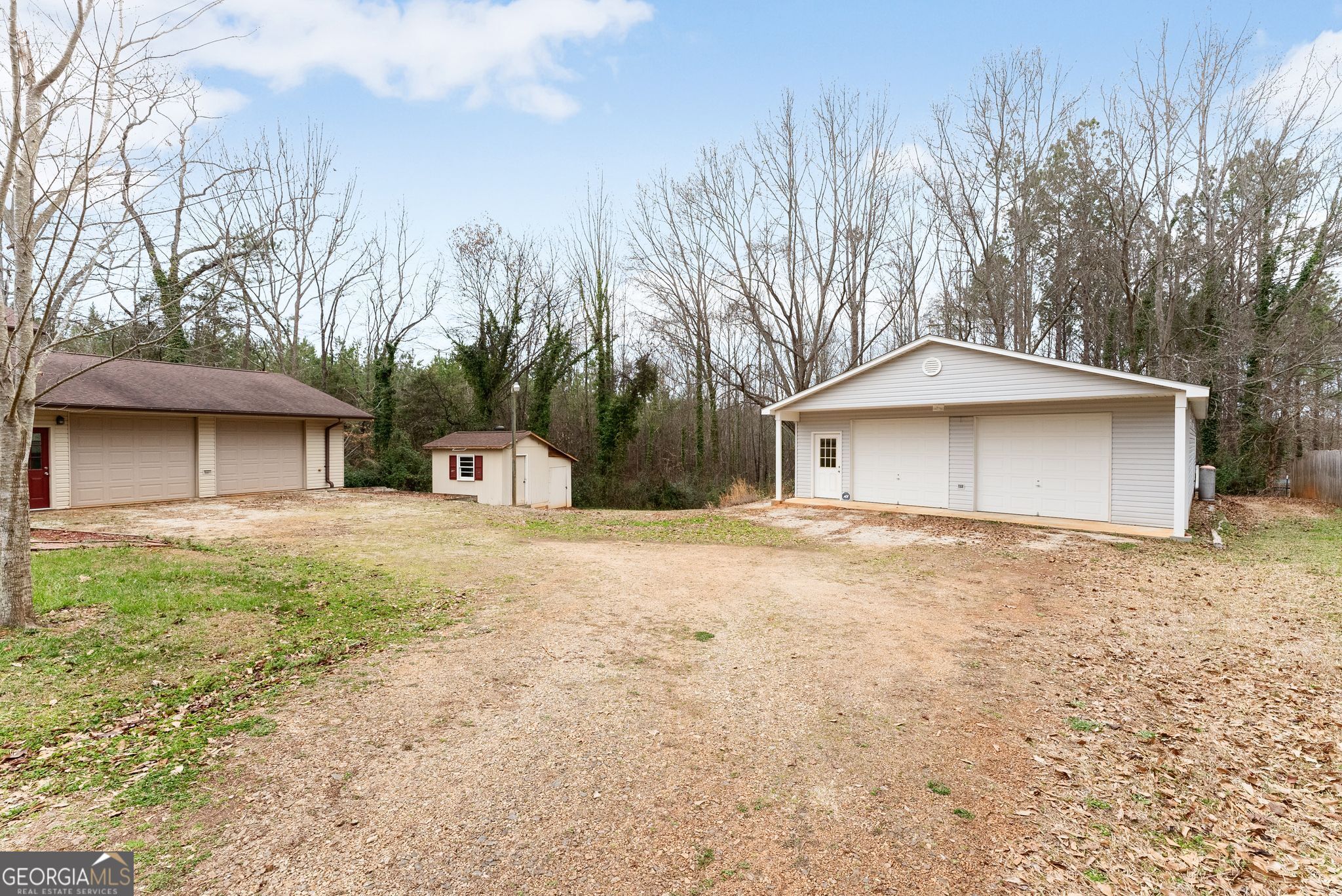 1292 Fernside Drive Toccoa, GA 30577 - Photo 39 of 42 a front view of a house with a yard and garage