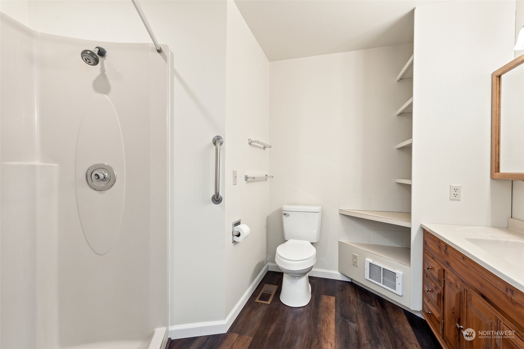 240 East Canyon View Road Belfair, WA 98528 - Photo 20 of 38 a bathroom with a granite countertop toilet a sink and a shower