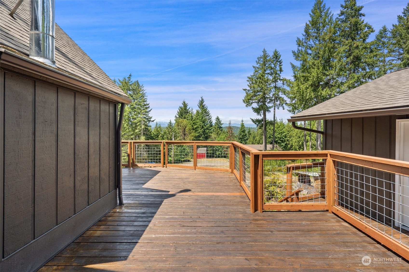 240 East Canyon View Road Belfair, WA 98528 - Photo 28 of 38 a view of balcony with wooden floor and fence