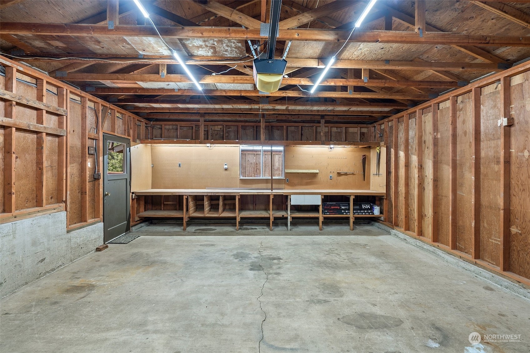 240 East Canyon View Road Belfair, WA 98528 - Photo 30 of 38 a view of a room with wooden walls
