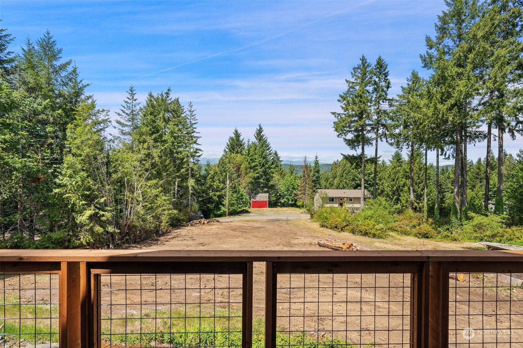 240 East Canyon View Road Belfair, WA 98528 - Photo 3 of 38 a view of a backyard from a balcony