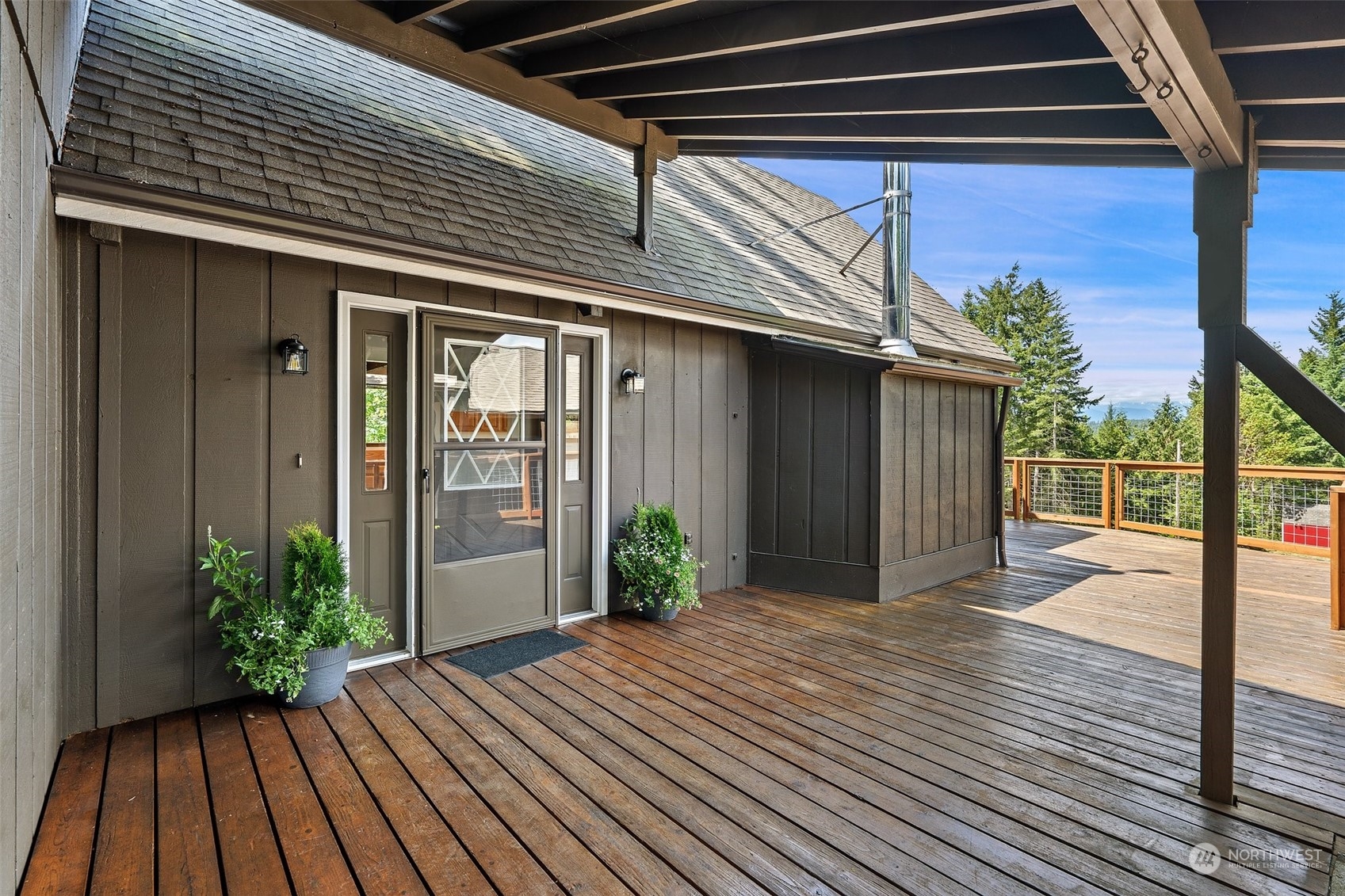 240 East Canyon View Road Belfair, WA 98528 - Photo 5 of 38 a view of a house with a porch