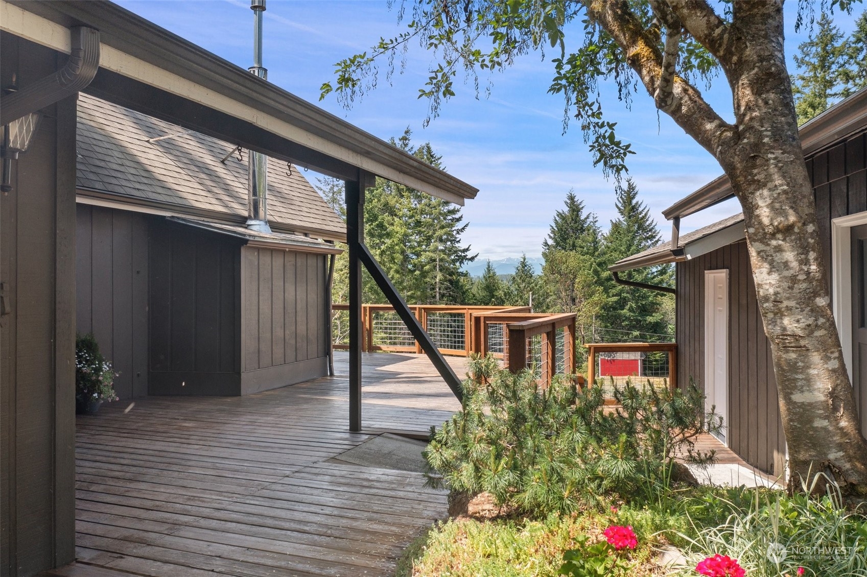 240 East Canyon View Road Belfair, WA 98528 - Photo 6 of 38 a balcony view with a seating space