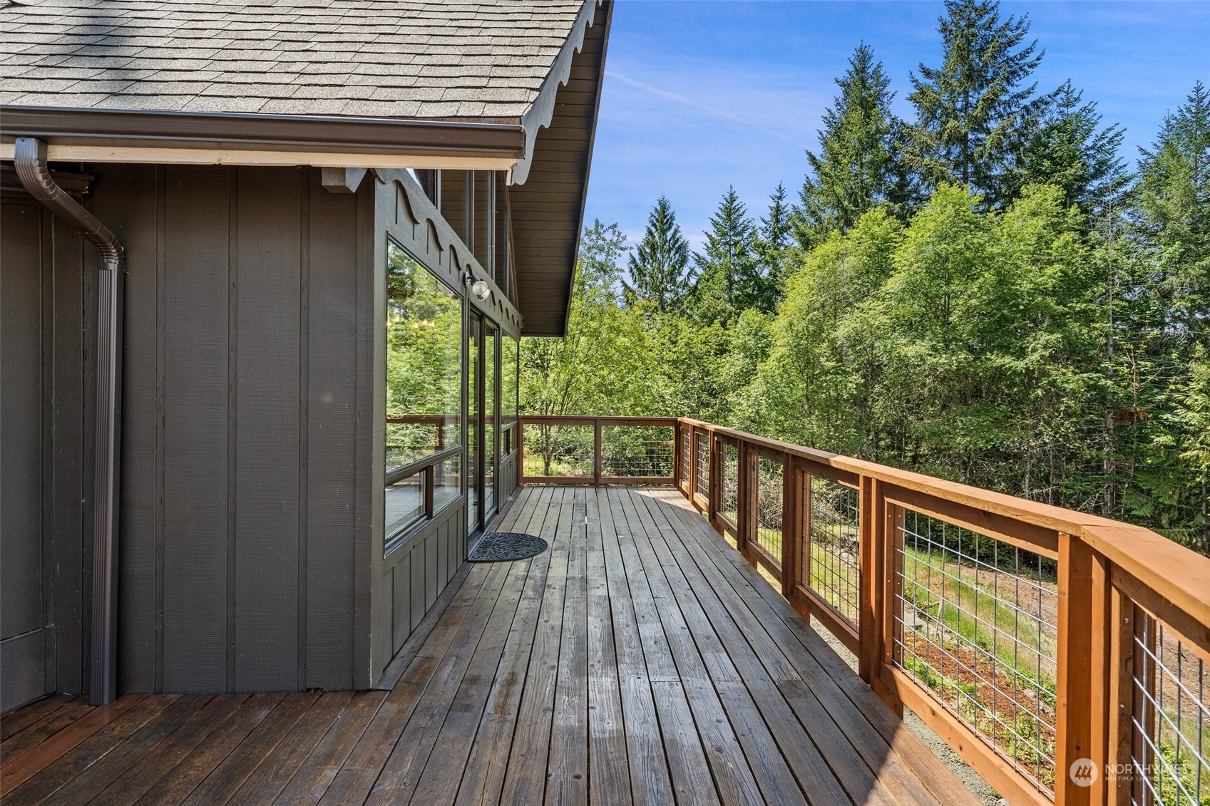 240 East Canyon View Road Belfair, WA 98528 - Photo 7 of 38 a view of balcony with wooden floor and fence