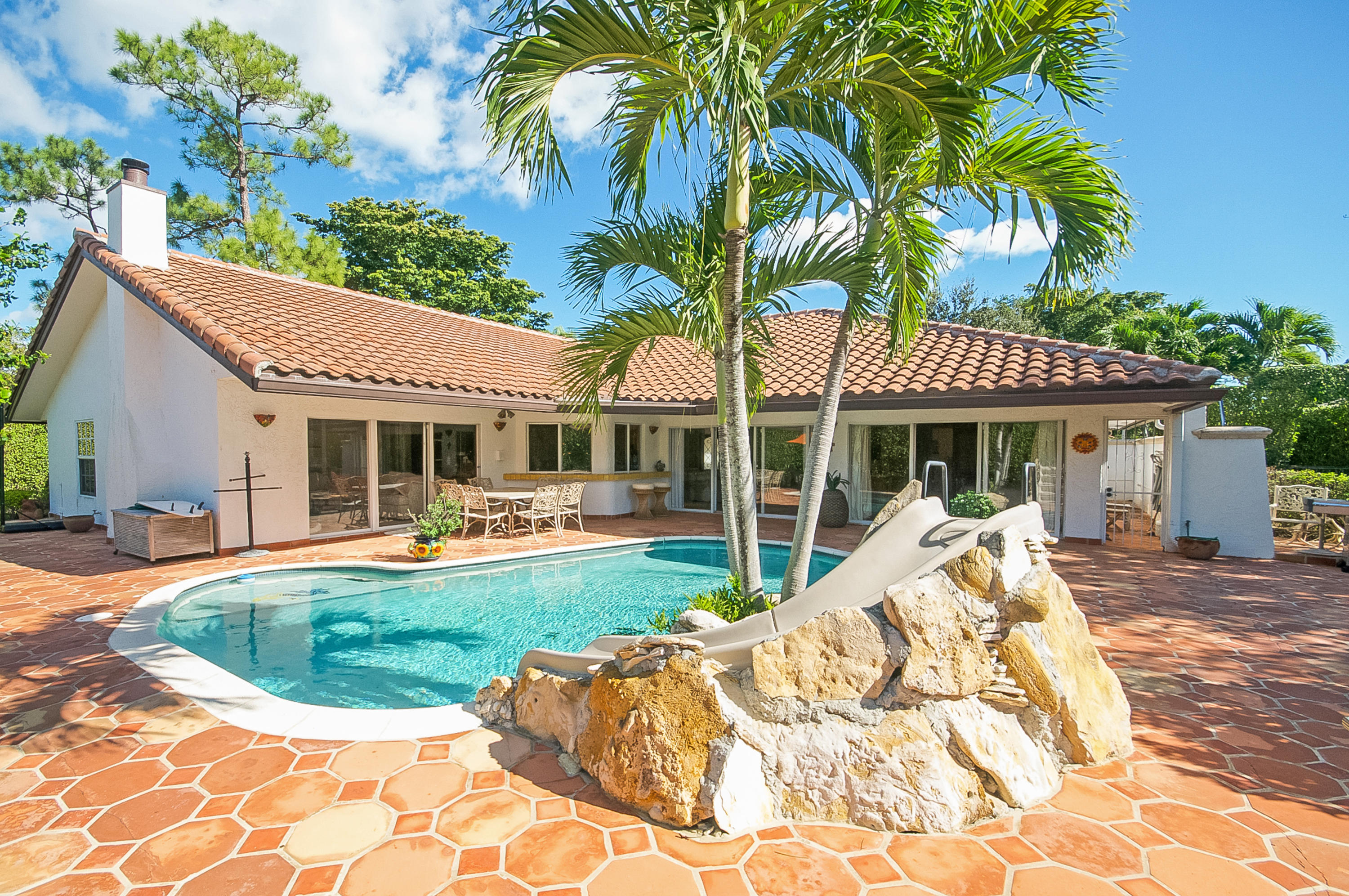 2751 Northwest 26th Court Boca Raton, FL 33434 - Photo 25 of 27 Pool with Waterslide