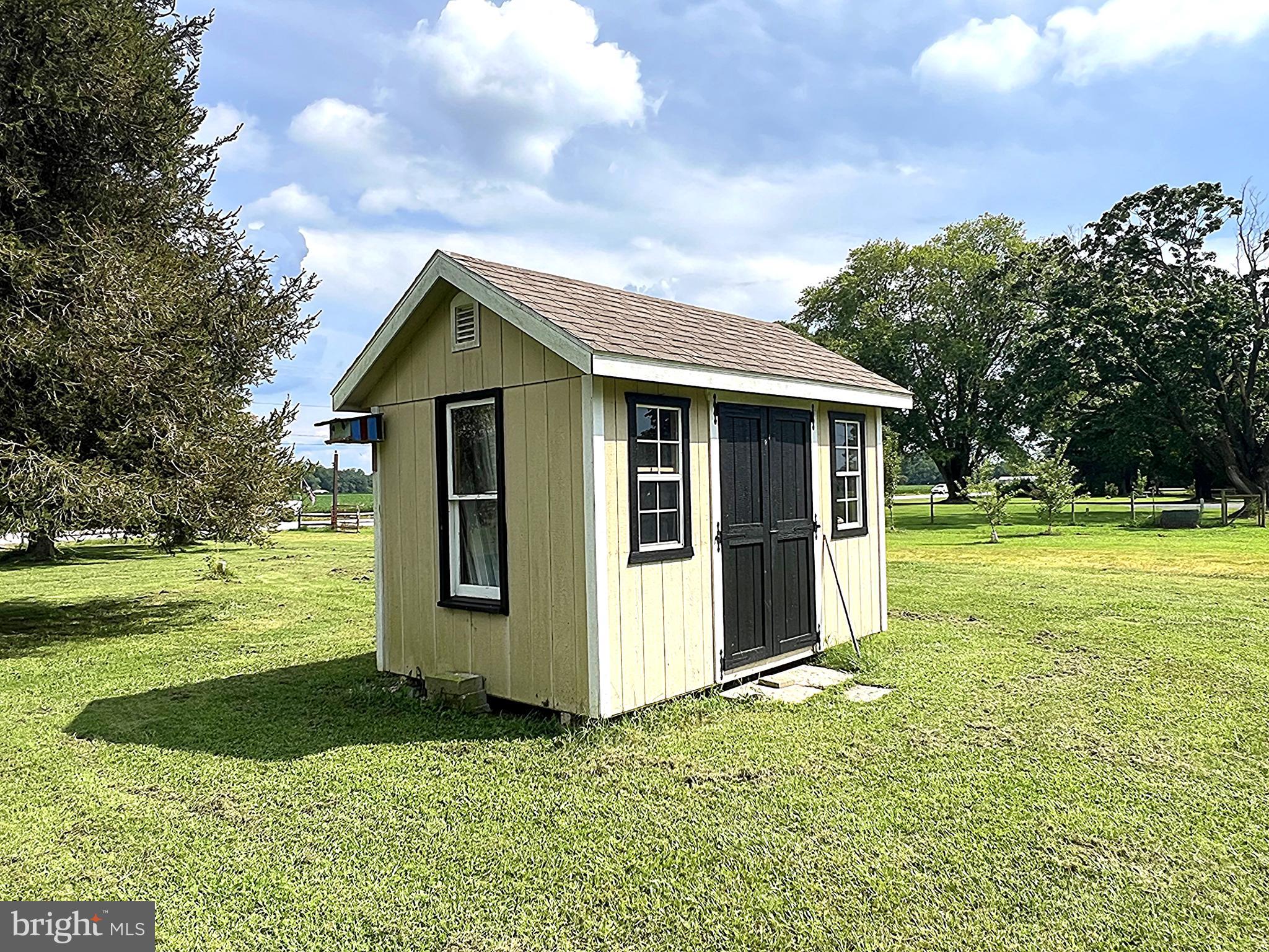 7224 Rock Hall Road Rock Hall, MD 21661 - Photo 11 of 12 a view of a house with garden